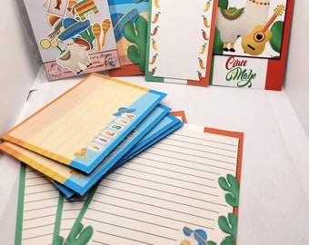 May include: A set of printable cards and stationery featuring a llama wearing a sombrero and playing a guitar. The cards have a Cinco de Mayo theme with green cactus and red chili pepper designs. The stationery has lined paper with a cactus and llama design.