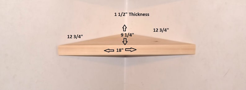 May include: A light-colored wooden corner shelf with dimensions labeled: 1 1/2" thickness, 12 3/4" along the sides, 9 1/4" depth from the corner to the front edge, and 18" across the front edge. The shelf is triangular with a curved front.
