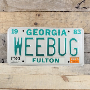 Georgia License plate, Custom Vanity Plate 1983 - WEEBUG - Vintage Green on White Reflectorized, Metal Pressed Passenger Automobile