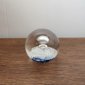 Selkirk Glass, Scotland, Harmony 1983 102/500 glass paperweight, center bubble blue base, eruption center, signed dated,