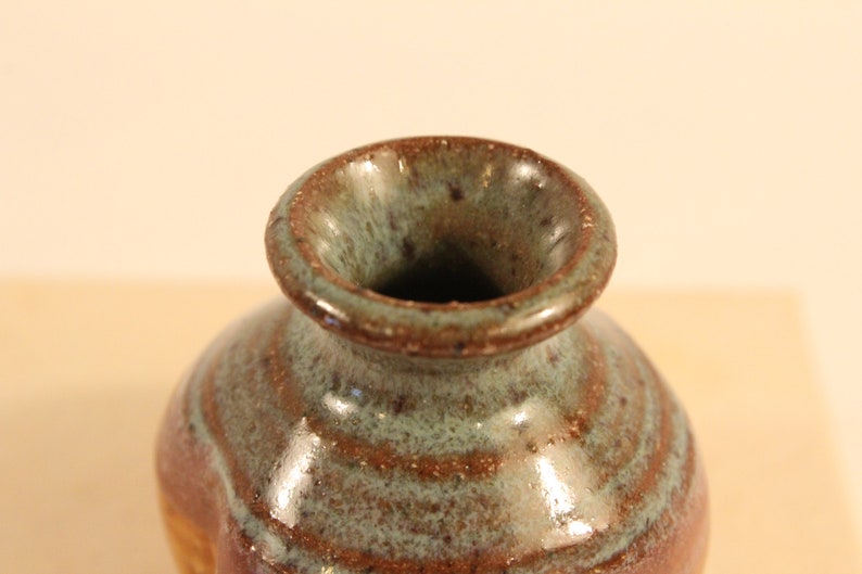 Tan red brown clay Art Pottery signed mini vase Found in Atlanta area Brown colors pottery vase Artist signed hand crafted clay Green