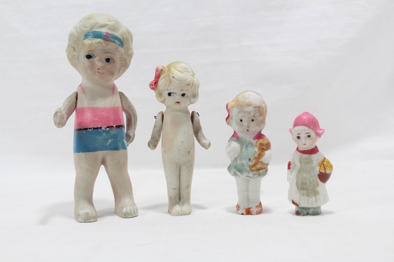Bisque jointed arms Doll Vintage 1930/'s Japan Bathing Beauty Ceramic Bisque Penny doll Molded blonde hair with blue ribbon