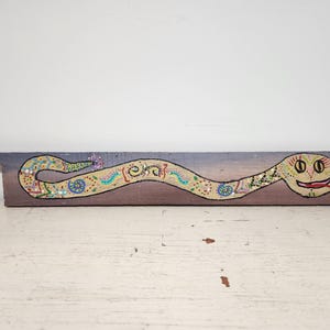 Folk art artist signed, Golden Swirl Snake, Funky art on wood - 20 1/2 x 3 1/4