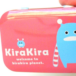 Alien Party Favors are Altoids Type Small Metal Boxes with a Hinged Lid, Kira Kira Planet Brightly Colored Hinged Box is 3 inch x 2 inch
