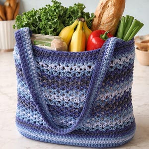 May include: A set of three ceramic mugs with a speckled, matte finish. The mugs are in shades of cream, light gray, and dark gray. Each mug has a simple, minimalist design, perfect for coffee or tea.