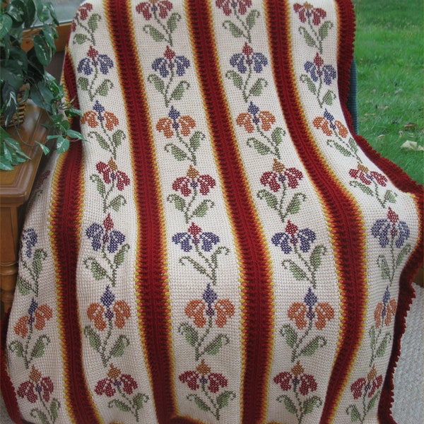 Flaming Floral Tunisian Cross-Stitch Afghan Pattern The beautiful of Fall Flowers bring warmth and relaxation into any room in home.
