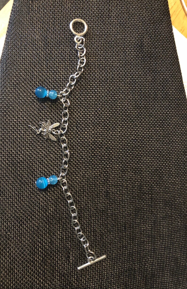 Water Fairy Bracelet toggle clasp fantasy fairies silver toned small fairy charm steel gift for her jewelry metal ringed blue beads