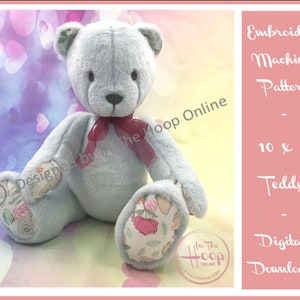 May include: A digital download pattern for a 10 inch by 6 inch teddy bear. The pattern is for an embroidery machine and features a light blue teddy bear with floral fabric accents. The pattern is designed by "In the Hoop Online".