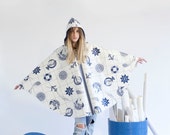 Raincape with hood "old sea dog"
