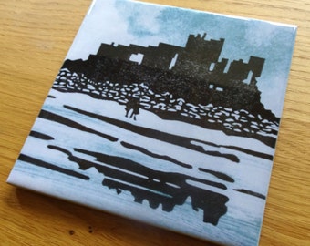 Coaster of Bamburgh Castle, Northumberland, woodblock print, ceramic tile