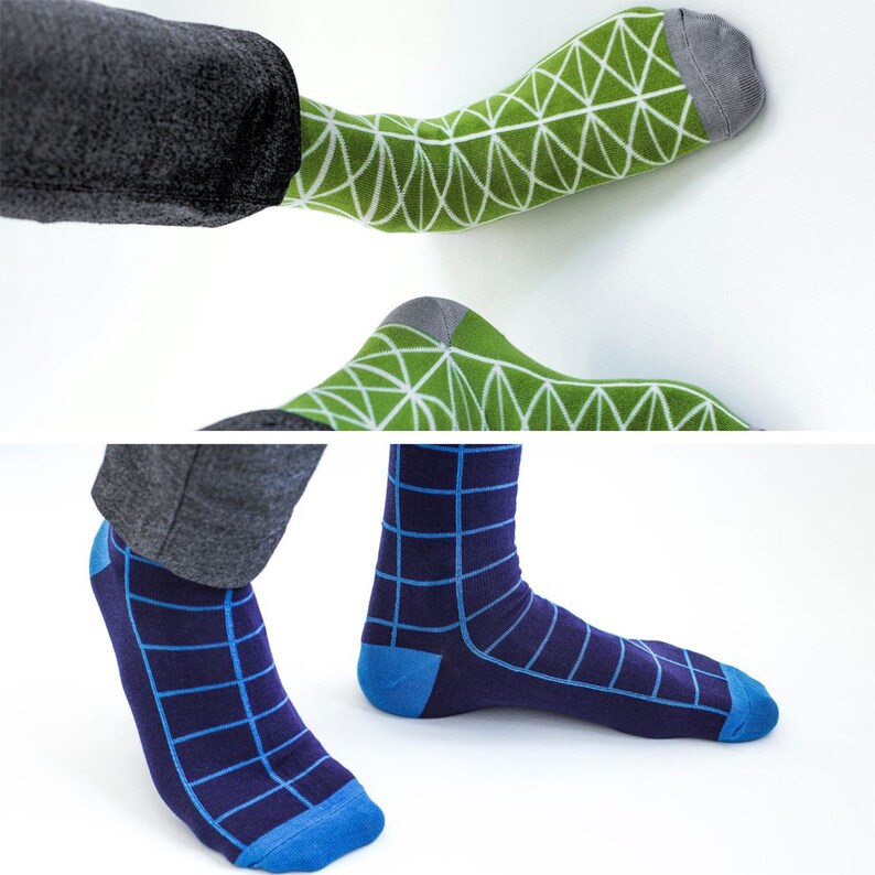May include: Two pairs of socks with geometric patterns. One pair is green with white geometric shapes, the other is blue with white geometric shapes.