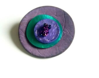 broche bouton violet/vert