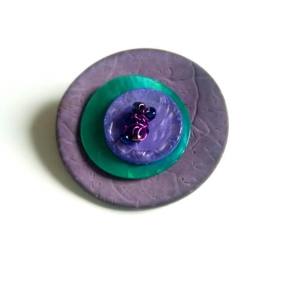 broche bouton violet/vert