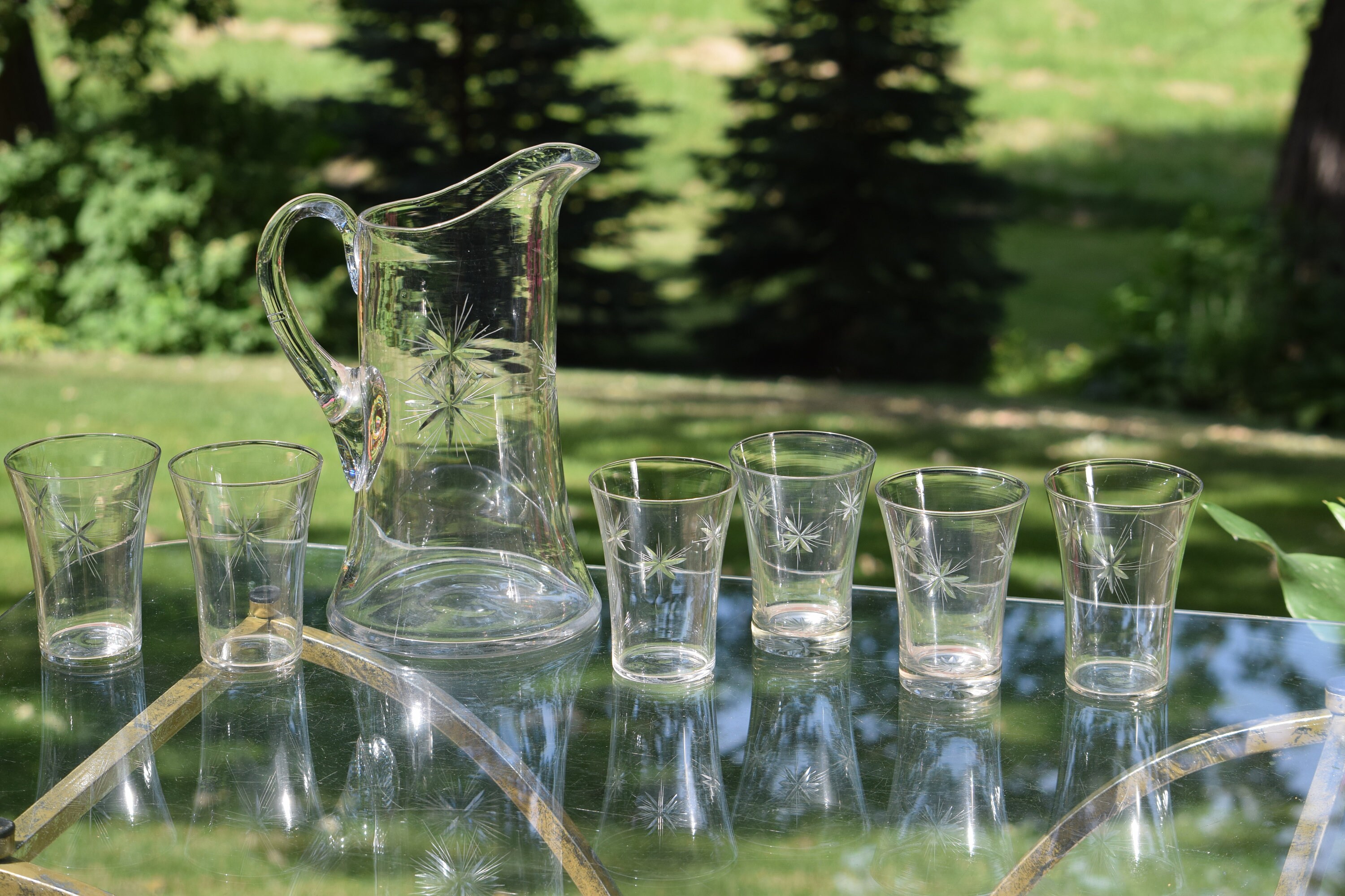 Vintage Etched Starburst Pitcher with matching Wine Glasses