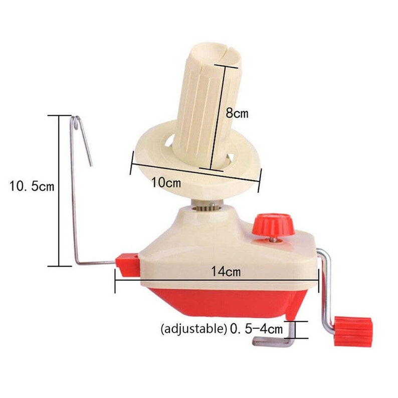 May include: A cream and red yarn winder with measurements labeled in centimeters. The winder has a cream-colored cone, a red crank, and a metal yarn guide. The base is 14 cm wide, and the cone is 8 cm tall.