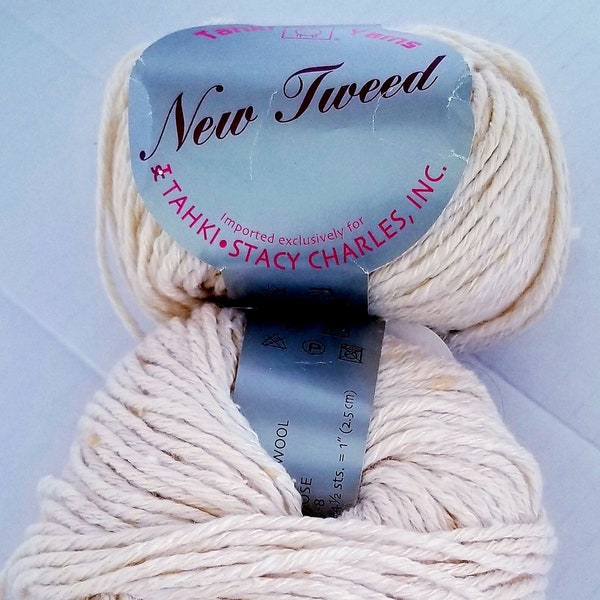 New Tweed by Tahki Yarns is a soft wool/silk blend yarn, wrapped by a fine strand of viscose Col.#056 lot 7060 available 13 enough for a top