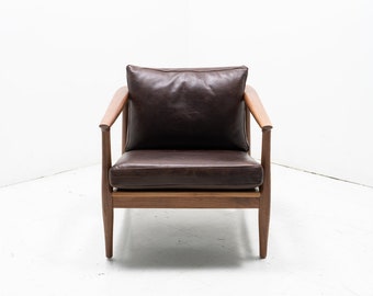 Mid Century Style "Dux" Leather Lounge Chair
