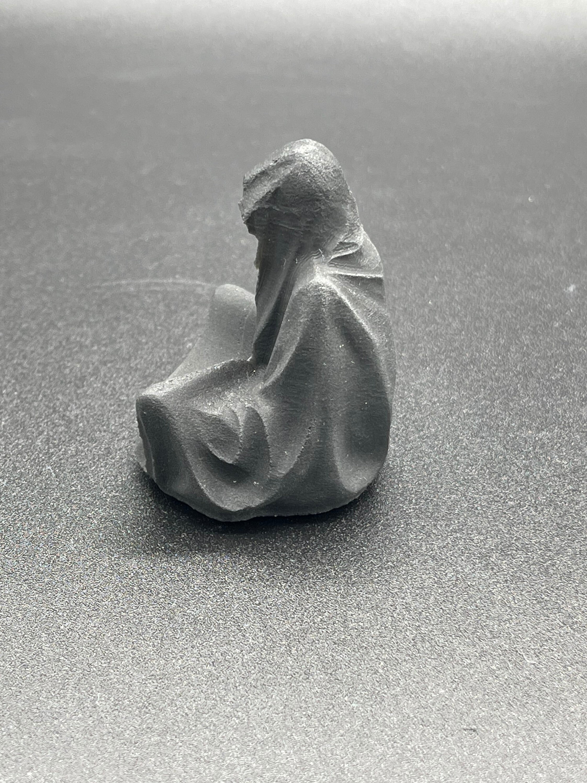 Tête de fantôme sculptée en obsidienne naturelle, cristal poli