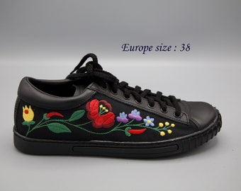 Embroidered canvas shoes in black colour combined with leather cushioned inside comfortable everyday shoes for walking in the town evening