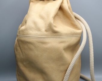 Leather duffel bag with rope 100% genuine leather pastel yellow colour shoulder crossbody rucksack everyday use  relaxed gym bag men women