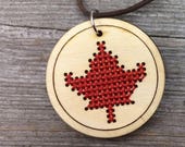 Cross stitch Canadian maple leaf pendant necklace medllion on faux leather with lobster clasp by Canadian Stitchery