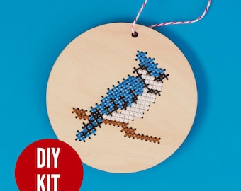 Blue jay wood cross stitch ornament kit - beginner DIY craft project by Canadian Stitchery