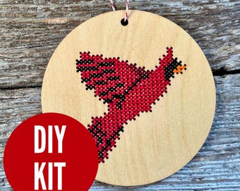 Flying cardinal ornament - easy DIY cross stitch kit - laser cut wood cross stitch project for beginners - by Canadian Stitchery