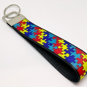 Llavero de pulsera para concienciar sobre el autismo