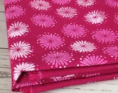 Bright cerise, magenta heavy weight calico cotton fabric with hand printed flowers design in white and pink