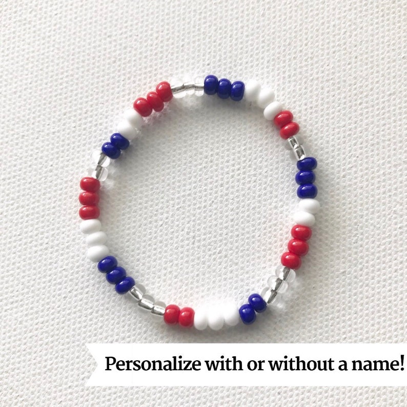 May include: A red, white, and blue beaded bracelet with silver spacers.  Personalize with or without a name!