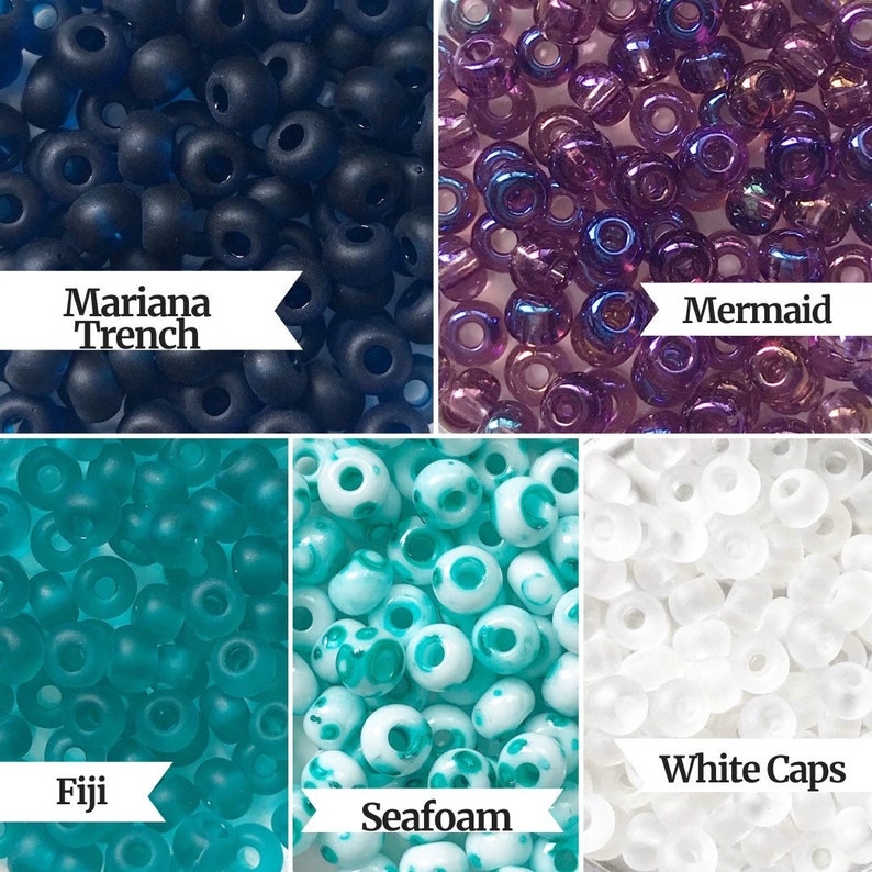May include: Assortment of seed beads in various colors, including black, purple, teal, white, and turquoise. The beads are labeled with names like "Mariana Trench", "Mermaid", "Fiji", "Seafoam", and "White Caps".