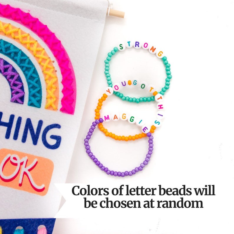May include: Three colorful beaded bracelets with the words "STRONG", "YOU GOT THIS", and "MAGGIE" spelled out. The beads are different colors, and the text says "Colors of letter beads will be chosen at random".