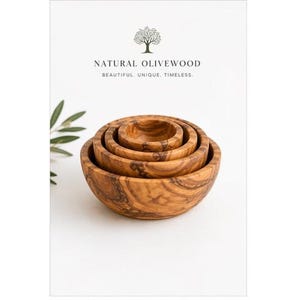 May include: A set of four olive wood bowls nested together. The bowls are various sizes, with a natural wood grain pattern. The text "NATURAL OLIVEWOOD" and "BEAUTIFUL. UNIQUE. TIMELESS." is printed above the bowls.
