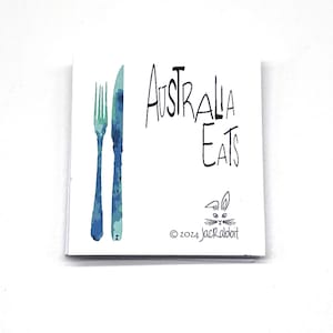 May include: A white square card with the text "AUSTRALIA EATS" in black, accompanied by a watercolor illustration of a blue fork and knife. The card also features a rabbit logo and the copyright "© 2024 JackRabbit".