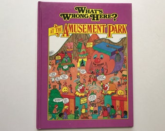 1991 At the Amusement Park Hardcover Look and Find Book Search Hidden Object Kids Whats Wrong Here?