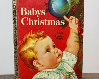 May include: Vintage "Baby's Christmas" Little Golden Book. The cover is red with the title in white. An illustration shows a baby reaching for a blue Christmas ornament. The baby is wearing a white and light blue patterned outfit.