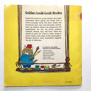 May include: A yellow book cover with a cat holding paintbrushes and a mouse on a swing. The book title is "Golden Look-Look Books" and the text describes the book series.
