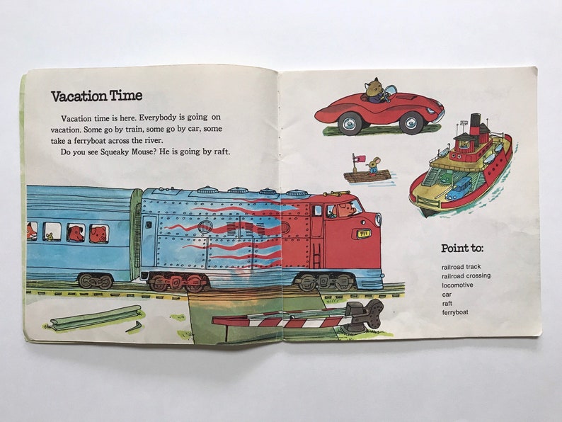 May include: A colorful illustration of a train, car, ferryboat, and raft. The train is red and blue with a red locomotive and blue passenger cars. The car is red. The ferryboat is red and white with a blue car inside. The raft is yellow with a brown mouse on it. The text on the page reads "Vacation Time" and "Point to: railroad track, railroad crossing, locomotive, car, raft, ferryboat."
