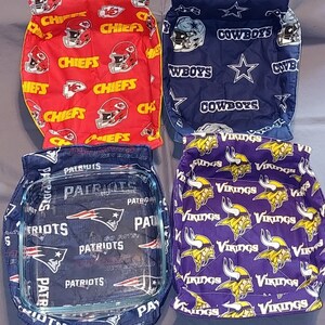 May include: Four different fabric casserole dish carriers. Each carrier is made of a different NFL team fabric. The carriers are red with the Kansas City Chiefs logo, blue with the Dallas Cowboys logo, purple with the Minnesota Vikings logo, and blue with the New England Patriots logo.