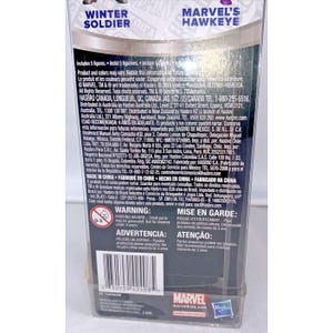 May include: A plastic package containing a Marvel's Hawkeye and Winter Soldier action figure set. The package is red, black, and white with the Marvel logo and the words "Marvel's Hawkeye" and "Winter Soldier".