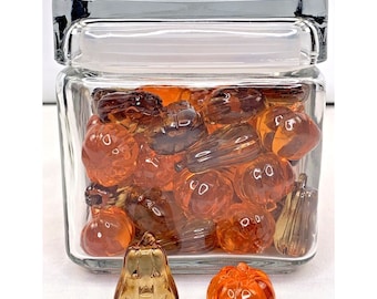 Halloween Anchor Hocking Jar gevuld met plastic pompoenen en lantaarns
