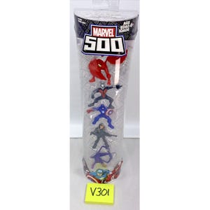 May include: A clear plastic tube containing five small Marvel 500 action figures. The figures are of Ant-Man, Captain America, Black Widow, Scarlet Witch, and Hawkeye. The tube has a yellow label with the text "V301" on it.