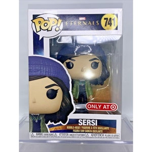 May include: A Funko Pop! vinyl figure of Sersi from the Marvel movie Eternals. The figure is wearing a green jacket, a blue beanie, and a necklace. The box is blue and white with the Marvel logo and the words "Eternals" and "741". The box also says "Only at Target".