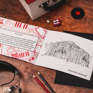 May include: A black and white illustration of Usher Hall in Edinburgh, Scotland. The illustration is on a white page with the text "Usher Hall, Edinburgh" at the bottom. The illustration is surrounded by a black border.
