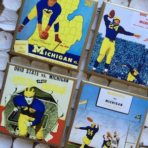 COASTERS! Throwback Michigan football program cover coasters with gold trim.