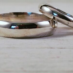 Male and Female polished Wedding Bands made in Sterling Silver!