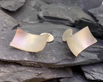 A unique set of delicate cufflinks made from sterling silver