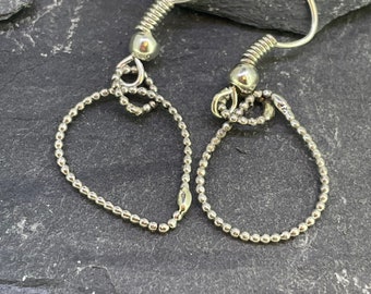 Teardrop shaped earrings made from sterling silver beaded wire