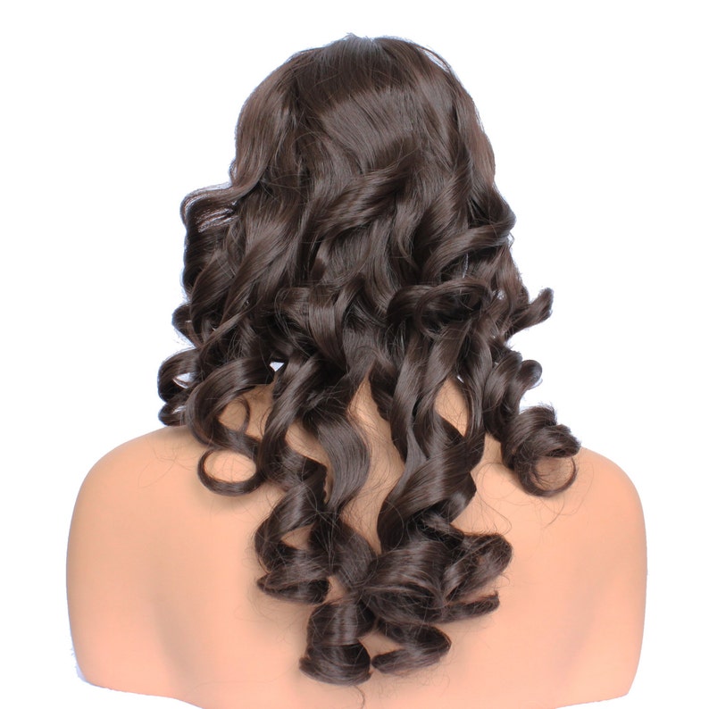 May include: A brown curly human hair wig on a mannequin head.