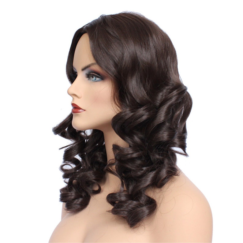 May include: A long, dark brown wig with loose curls. The wig is styled with a side part and the curls fall to the shoulders.
